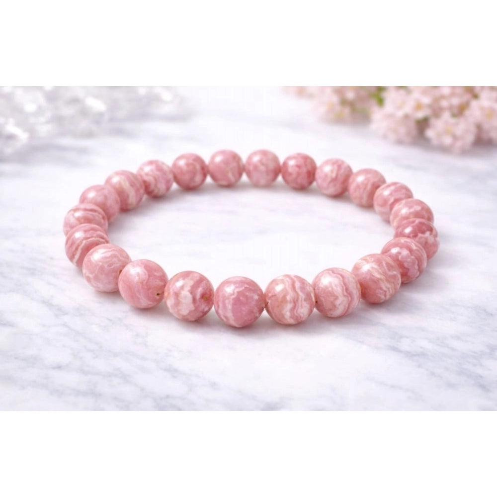 Snuggle Lifestyle Co. Natural Crystal 8mm Rhodochrosite Bracelet (Pink)