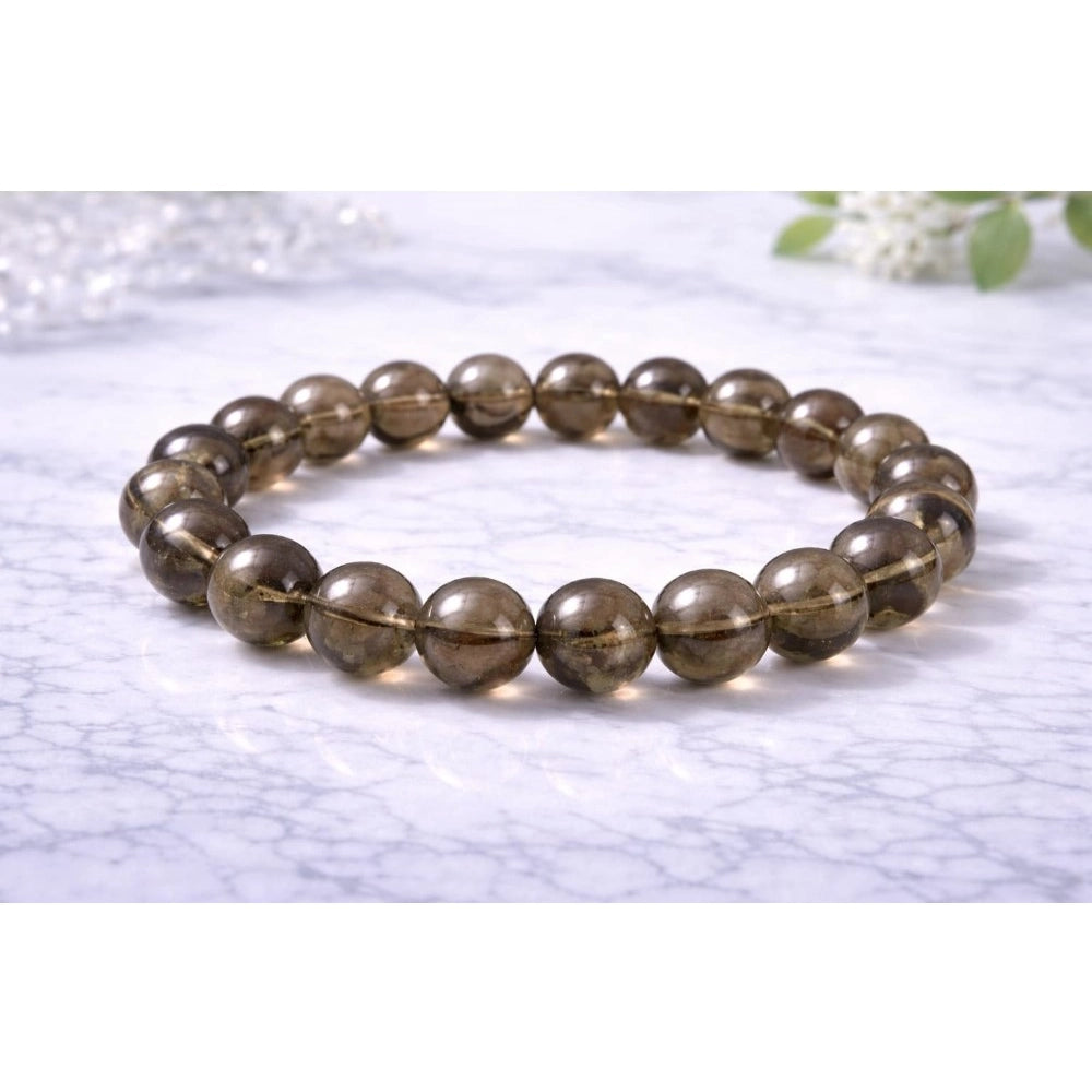 Snuggle Lifestyle Co. Natural Crystal 8mm Smoky Quartz Bracelet  (Brown)